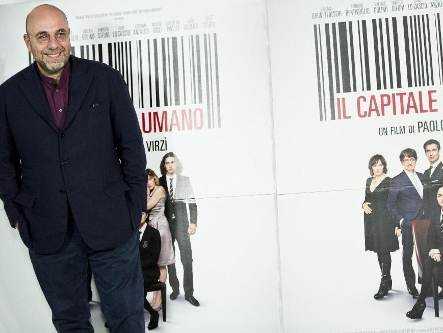 Paolo Virzì, al centro, con parte del cast del Capitale umano (foto Guido Montani-Ansa)