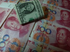 Cina, Banca centrale taglia tassi su depositi overnight e a 7 gg