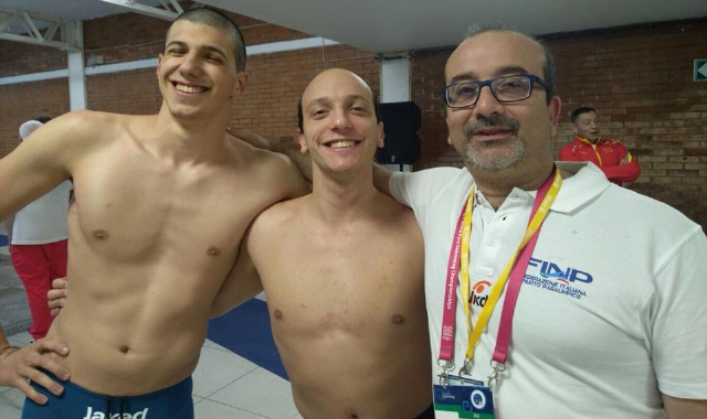 Federico Morlacchi e Simone Barlaam con l’allenatore Massimiliano Tosin