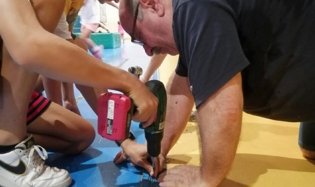 Genitori e atleti in azione al Paladozio