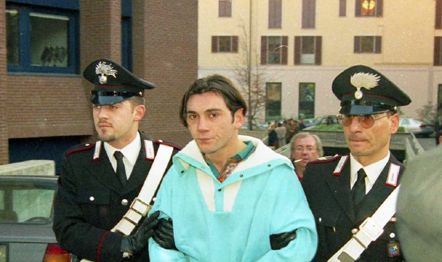 Elia Del Grande, all’epoca 23enne, portato in Tribunale a Varese dopo l’arresto