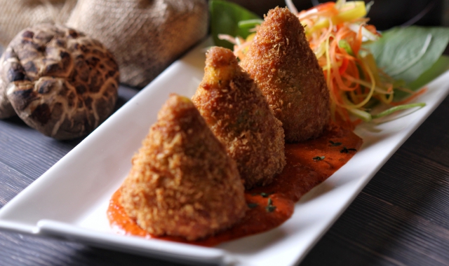 Arancini, specialità siciliane (foto Archivio)