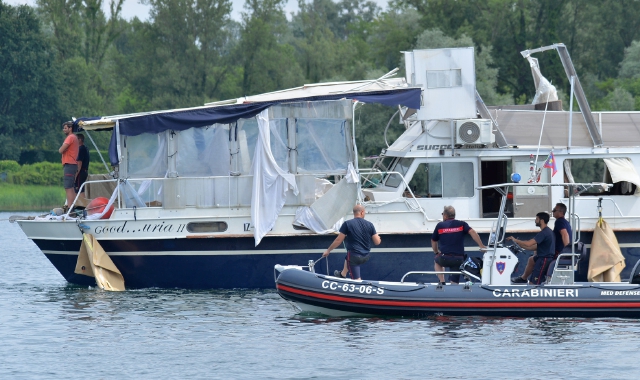 La “Gooduria”, l’imbarcazione con tanti agenti segreti a bordo, inabissatasi nel lago Maggiore domenica 28 maggio, causando la morte di quattro persone. Al centro un momento del Palio dei rioni