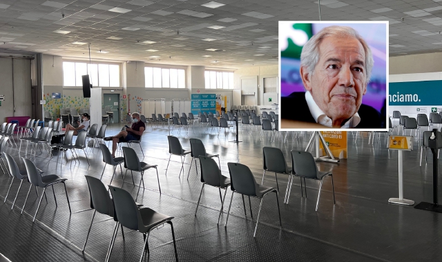 L’interno del Casermone, hub vaccinale in periodo Covid, e l’assessore regionale Guido Bertolaso