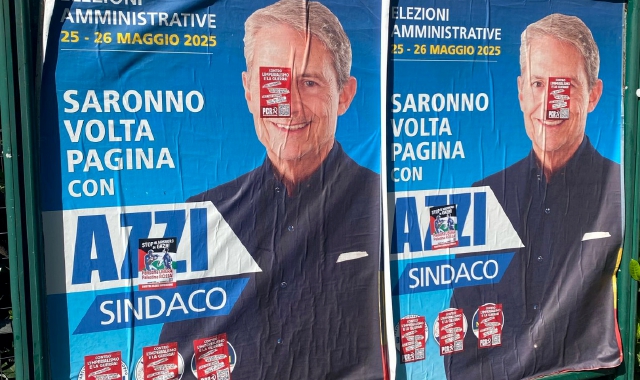 Saronno, adesivi sui manifesti di Azzi