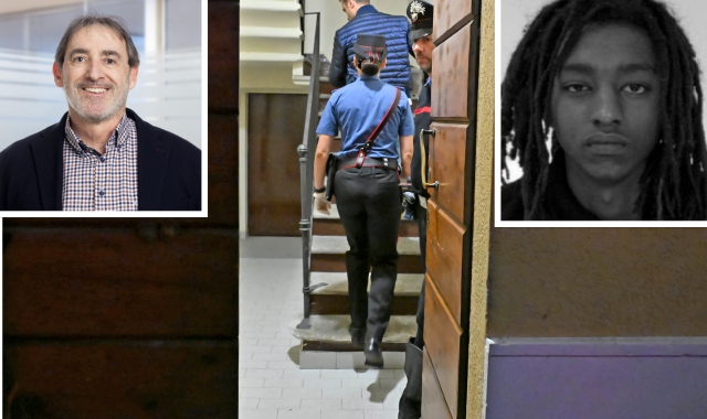 I carabinieri di Luinodavanti alla casa di via Vittorio Veneto  in cui domenica sera è avvenuto il delitto(foto Blitz)